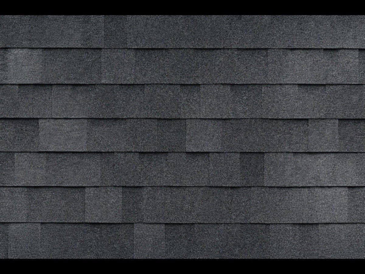 Shingle roof and roofline detail on an Alberta home