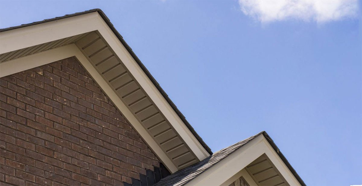 Soffit and fascia along a residential roof edge